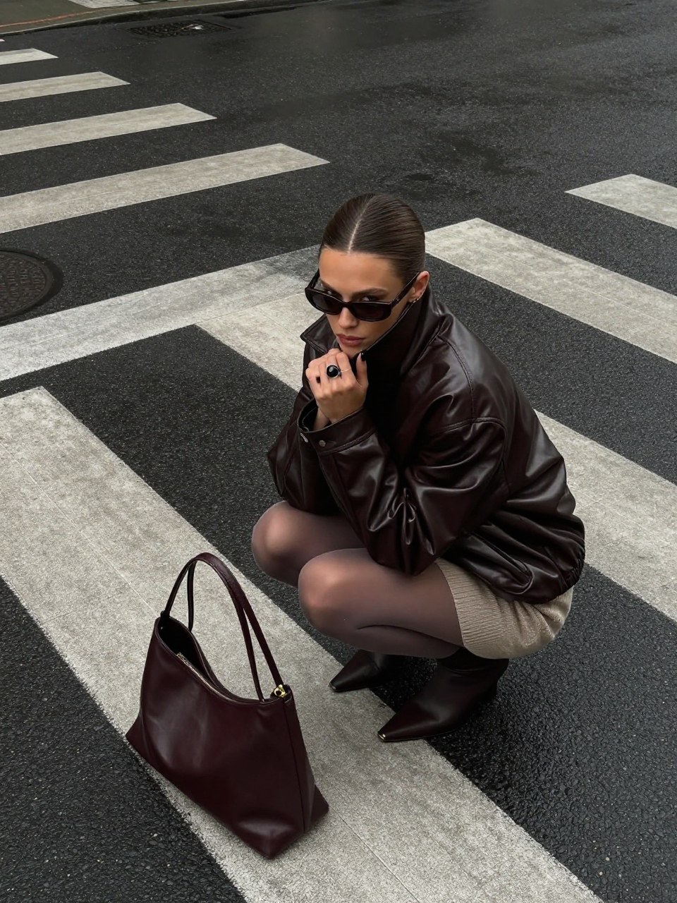 Z-Image Turbo generation: Create a photorealistic editorial street-fashion photograph, vertical 4:5. High-angle over…